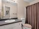 Bathroom featuring a vanity with a sink, a toilet, and a shower with a curtain at 502 Owens Springs Ln, Mcdonough, GA 30252