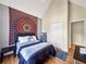 Bedroom featuring a vaulted ceiling, closet and connecting door at 502 Owens Springs Ln, Mcdonough, GA 30252