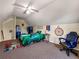 Bedroom featuring a fun decor, comfortable seating and a ceiling fan at 502 Owens Springs Ln, Mcdonough, GA 30252