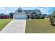 Charming single-Gathering home with a well-manicured lawn and a two-car garage at 502 Owens Springs Ln, Mcdonough, GA 30252