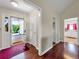 Bright entryway with wood floors, leading to the living areas at 502 Owens Springs Ln, Mcdonough, GA 30252