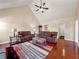 Spacious living room with high ceilings, wood floors, and natural light at 502 Owens Springs Ln, Mcdonough, GA 30252