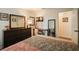 Bedroom with a large dresser, vanity mirror, and decor for a comfortable and stylish look at 123 Stoneforest Dr, Woodstock, GA 30189