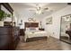 Bedroom featuring dark wood furniture and a ceiling fan at 123 Stoneforest Dr, Woodstock, GA 30189