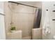 Shower featuring tile surround and a hand held shower head at 123 Stoneforest Dr, Woodstock, GA 30189
