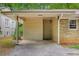 View of the carport area of home featuring concrete flooring and neutral-colored walls at 1460 Briarcliff Ne Rd, Atlanta, GA 30306