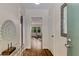Inviting foyer showcasing hardwood floors, elegant decor, and an open view to the living room at 1460 Briarcliff Ne Rd, Atlanta, GA 30306