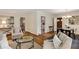 Bright and open living room area with hardwood floors, comfortable seating, and a dining space at 1460 Briarcliff Ne Rd, Atlanta, GA 30306