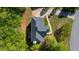 Aerial view showing the roof of the house, driveway, and mature landscaping at 1820 Lyon Sw Ave, Atlanta, GA 30331