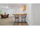 This home offers a basement bar area with seating and a dining table at 1820 Lyon Sw Ave, Atlanta, GA 30331