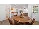 Basement entertainment area with wood table, statue, and back door access at 1820 Lyon Sw Ave, Atlanta, GA 30331