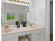 This primary bathroom offers a double sink vanity with a separate shower at 1820 Lyon Sw Ave, Atlanta, GA 30331