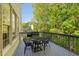 View of an outdoor deck featuring a table and chairs, perfect for relaxing in a private backyard at 1820 Lyon Sw Ave, Atlanta, GA 30331