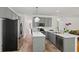 Modern kitchen with gray cabinets, stainless steel appliances, and white countertops at 1820 Lyon Sw Ave, Atlanta, GA 30331