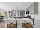 Modern kitchen featuring stainless steel appliances, granite countertops, and a tile backsplash at 1820 Lyon Sw Ave, Atlanta, GA 30331