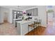 Charming kitchen with stainless steel appliances, bar seating, and an open layout at 1820 Lyon Sw Ave, Atlanta, GA 30331