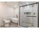 Modern bathroom featuring a walk-in shower, soaking tub, and stylish tile work at 214 Adeline Nw Ave, Atlanta, GA 30314
