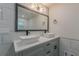 Modern bathroom with dual sinks, stylish vanities, and a large framed mirror at 214 Adeline Nw Ave, Atlanta, GA 30314