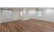 Spacious bedroom with vinyl floors, natural light and closet with unique sliding doors at 214 Adeline Nw Ave, Atlanta, GA 30314