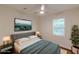 Bedroom with a modern bed and a TV mounted on the wall at 214 Adeline Nw Ave, Atlanta, GA 30314