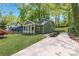 Charming home featuring a well-manicured front yard and a welcoming covered porch at 214 Adeline Nw Ave, Atlanta, GA 30314