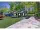 Charming home with a welcoming front porch and a well-maintained lawn, ideal for curb appeal at 214 Adeline Nw Ave, Atlanta, GA 30314
