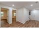Hallway with open doorways and wood flooring at 214 Adeline Nw Ave, Atlanta, GA 30314