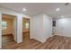 Hallway with wood floors and multiple rooms connected at 214 Adeline Nw Ave, Atlanta, GA 30314