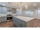 Spacious kitchen with stainless steel appliances, center island, and ample cabinet space at 214 Adeline Nw Ave, Atlanta, GA 30314