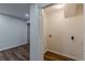 Convenient laundry room with wood-look flooring offers functionality and style at 214 Adeline Nw Ave, Atlanta, GA 30314