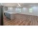 Open floor plan showcasing the kitchen with quartz countertops and the living area at 214 Adeline Nw Ave, Atlanta, GA 30314