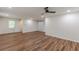 Expansive living area enhanced by recessed lighting and chic wood-look floors at 214 Adeline Nw Ave, Atlanta, GA 30314