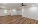 Bright living room offers recessed lighting, sliding doors, and luxury vinyl floors at 214 Adeline Nw Ave, Atlanta, GA 30314