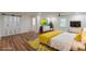 Main bedroom features wood-look flooring, large closet and ensuite bathroom at 214 Adeline Nw Ave, Atlanta, GA 30314