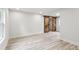 A well-lit room featuring light floors and a sliding barn door at 2554 Gordon Se Cir, Smyrna, GA 30080