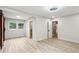 Bedroom boasts recessed lighting, wood flooring, large windows, and a stylish closet and bathroom door at 2554 Gordon Se Cir, Smyrna, GA 30080