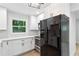Bright and modern kitchen with granite counters, stainless steel appliances and new cabinets with a stylish backsplash at 2554 Gordon Se Cir, Smyrna, GA 30080