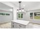 Kitchen featuring modern cabinetry, stylish light fixture, white countertop and updated appliances at 2554 Gordon Se Cir, Smyrna, GA 30080