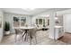 Inviting living area boasting ample natural light, updated flooring, and a seamless flow into the dining area at 2554 Gordon Se Cir, Smyrna, GA 30080
