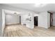 Spacious and open floor plan featuring sleek flooring, modern lighting, and easy access to the kitchen at 2554 Gordon Se Cir, Smyrna, GA 30080