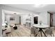 Bright and airy living space featuring modern finishes, open layout, updated lighting and stylish flooring at 2554 Gordon Se Cir, Smyrna, GA 30080