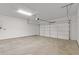 Spacious two-car garage with ample room for parking and storage at 235 Strawberry Ln, Woodstock, GA 30189