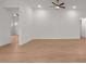Open-concept living room with hardwood floors and plenty of natural light at 235 Strawberry Ln, Woodstock, GA 30189