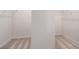 Empty walk-in closet features carpeted floors and wire shelving for optimal storage at 26 Kensington St, Kingston, GA 30145
