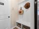 Convenient mudroom featuring a storage bench, hooks, and baskets offers practical organization at 26 Kensington St, Kingston, GA 30145