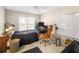 Bedroom with a bed, desk, and a whiteboard at 2945 Barimore Pl, Dacula, GA 30019