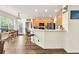 Kitchen with a breakfast bar and eat-in kitchen table near a door to the backyard at 2945 Barimore Pl, Dacula, GA 30019