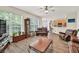 Open floor plan with living room, kitchen, and breakfast bar seating at 2945 Barimore Pl, Dacula, GA 30019