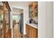 Butler's pantry area featuring glass front cabinetry and white countertop at 2945 Barimore Pl, Dacula, GA 30019