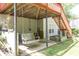 Covered patio with a swing, offering a relaxing outdoor space at 2945 Barimore Pl, Dacula, GA 30019